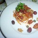 Linguine alla puttanesca con Pomodori San Marzano dell'Agro sarnese-nocerino DOP, tonno e noci abbinate al vino Magnifico Syrah dell'Azienda Calatrasi - -