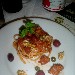 Linguine alla puttanesca con Pomodori San Marzano dell'Agro sarnese-nocerino DOP, tonno e noci abbinate al vino Magnifico Syrah dell'Azienda Calatrasi - -