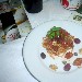 Linguine alla puttanesca con Pomodori San Marzano dell'Agro sarnese-nocerino DOP, tonno e noci abbinate al vino Magnifico Syrah dell'Azienda Calatrasi - -