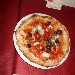 26/03 - Pizzeria Tot� e i sapori - Acerra (NA) - Seconda tappa di Pizzarelle a Go Go - Terza Pizzarella con mussillo di baccal�, olive di Gaeta, capperi di Pantelleria, pomodorini datterini freschi, origano di montagna calabrese, olio EVO DOP del cilento preparata da Mauro Autolitano - -