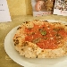 05/06 - Il Boccon Divino - Dragoni (CE) - Quarta Tappa di Pizzarelle a Go Go - la seconda pizzarella in degustazione : Menaica (filetti di San Marzano, aglio rosso di Sulmona, capperi, origano di Maiorano e acciughe di Menaica) preparata da Nicola Ricciardi - -