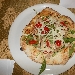 05/06 - Il Boccon Divino - Dragoni (CE) - Quarta Tappa di Pizzarelle a Go Go - la terza pizzarella : Boccon Divino (focaccia con straccetti di maiale nero casertano, pomodorini, rucola bio e scaglie di parmigiano) preparata da Lele Romano - -