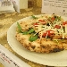 05/06 - Il Boccon Divino - Dragoni (CE) - Quarta Tappa di Pizzarelle a Go Go - la terza pizzarella : Boccon Divino (focaccia con straccetti di maiale nero casertano, pomodorini, rucola bio e scaglie di parmigiano) preparata da Lele Romano - -