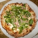 05/06 - Il Boccon Divino - Dragoni (CE) - Quarta Tappa di Pizzarelle a Go Go - la quinta pizzarella : Incontro (mozzarella, pesto di pistacchio di Bronte, Mortadella dop e insalatina di valeriana con scorzette di limone di Sorrento) preparata da Lele Romano - -