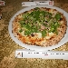 05/06 - Il Boccon Divino - Dragoni (CE) - Quarta Tappa di Pizzarelle a Go Go - la quinta pizzarella : Incontro (mozzarella, pesto di pistacchio di Bronte, Mortadella dop e insalatina di valeriana con scorzette di limone di Sorrento) preparata da Lele Romano - -