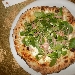 05/06 - Il Boccon Divino - Dragoni (CE) - Quarta Tappa di Pizzarelle a Go Go - la quinta pizzarella : Incontro (mozzarella, pesto di pistacchio di Bronte, Mortadella dop e insalatina di valeriana con scorzette di limone di Sorrento) preparata da Lele Romano - -
