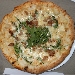 Sesta Tappa di Pizzarelle a Go Go - PalaPizza - Frattamaggiore (NA) - con il pizzaiolo Enrico Di Pietro e lo chef Antonio Arf� - le Pizzarelle: la quinta Pizzarella preparata da Enrico Di Pietro, crema ai 4 formaggi, rucola, provola, salsiccia e scaglie di grana - -