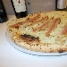 Settima Tappa di Pizzarelle a Go Go - Pizzeria Bella Napoli - Acerra (NA) - Seconda Pizzarella: Patate e pancetta (patate, formaggio caseificio Damigelli, pancetta di maialino nero dei monti prenestini), preparata da Stefano Bartolucci - -