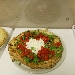 Settima Tappa di Pizzarelle a Go Go - Pizzeria Bella Napoli - Acerra (NA) - Quarta Pizzarella: Focaccia con stracciata pomodorini e rucola, preparata da Stefano Bartolucci - -
