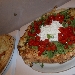 Settima Tappa di Pizzarelle a Go Go - Pizzeria Bella Napoli - Acerra (NA) - Quarta Pizzarella: Focaccia con stracciata pomodorini e rucola, preparata da Stefano Bartolucci - -