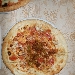 08/10 - 8� Tappa di Pizzarelle a Go Go - Pizzeria Tutino - Napoli - Pizzarella con baccal�, pomodorino ciliegino e julienne di porro, preparata da Vincenzo Galizia - -