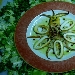 Delicatezza di calamari affumicati con mosaico di patate e peperoni - -