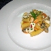 Rigatoni con polpa di ostriche, branzino e calamaretti su purea di fagioli - -