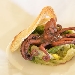 Polipetto affogato con scarola e pane croccante - -