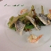 Trancio di spigola con carciofi e salsa verde - -