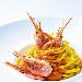 Tagliolini fatti in casa con gamberi e pomodorini - -