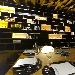 Sala del Gusto - Battipaglia (SA) - Il mobile libreria-teca offre la possibilit� di regolare la luce a seconda dei prodotti che si vogliono mostrare o esaltare grazie all'uso di strip-led integrate con l'arredo e posizionate in maniera strategica per gli effetti luminosi sui singoli prodotti e tipologie di materiali di packaging.