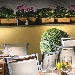 Roof Garden - Hotel Capo d'Africa (Roma) - La Terrazza offre un'atmosfera intima e rilassante per sorseggiare un drink al tramonto o per una cena a lume di candela. Un'occasione che render� la vostra vacanza romana indimenticabile.