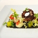 Polpo arrostito con patate, olive taggiasche, pomodori canditi e limoni di Sorrento - -