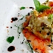 -Risotto al T� Nero affumicato al Pino, Vongole, Carpaccio di Gamberi Rossi, Fiori Eduli e riduzione di soia - -