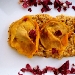 Cappellacci di merlot ripieni di trevigiana e bastardo del Grappa su crema di noci e zafferano - -