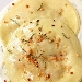 -RAVIOLI RIPIENI DI ZUCCA E SALSICCIA SU FONDUTA DI TALEGGIO ROSMARINO E NOCCIOLE - -