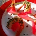 Fish's Aperol...Gamberoni marinati leggermente al Gin e polvere di prezzemolo,con aperol gelatinato. - -