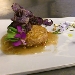 Hamburger di maialino da latte, salsa di fichi e patata viola croccante - -