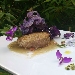 Hamburger di maialino da latte, salsa di fichi e patata viola croccante - -